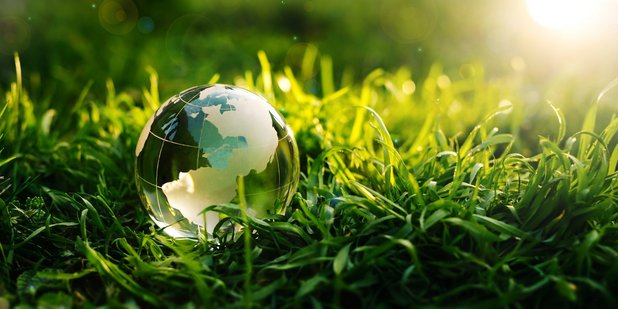 crystal-planet-earth-green-grass-sunset-environmental-earth-day-concept